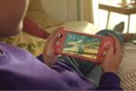 NINTENDO Switch Lite (Coral) and Switch Lite Carrying Case (Animal Crossing: New Horizons Edition) Bundle - Image 5
